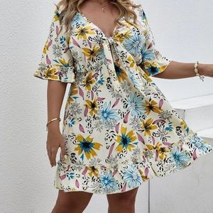 Floral mini dress with front tie